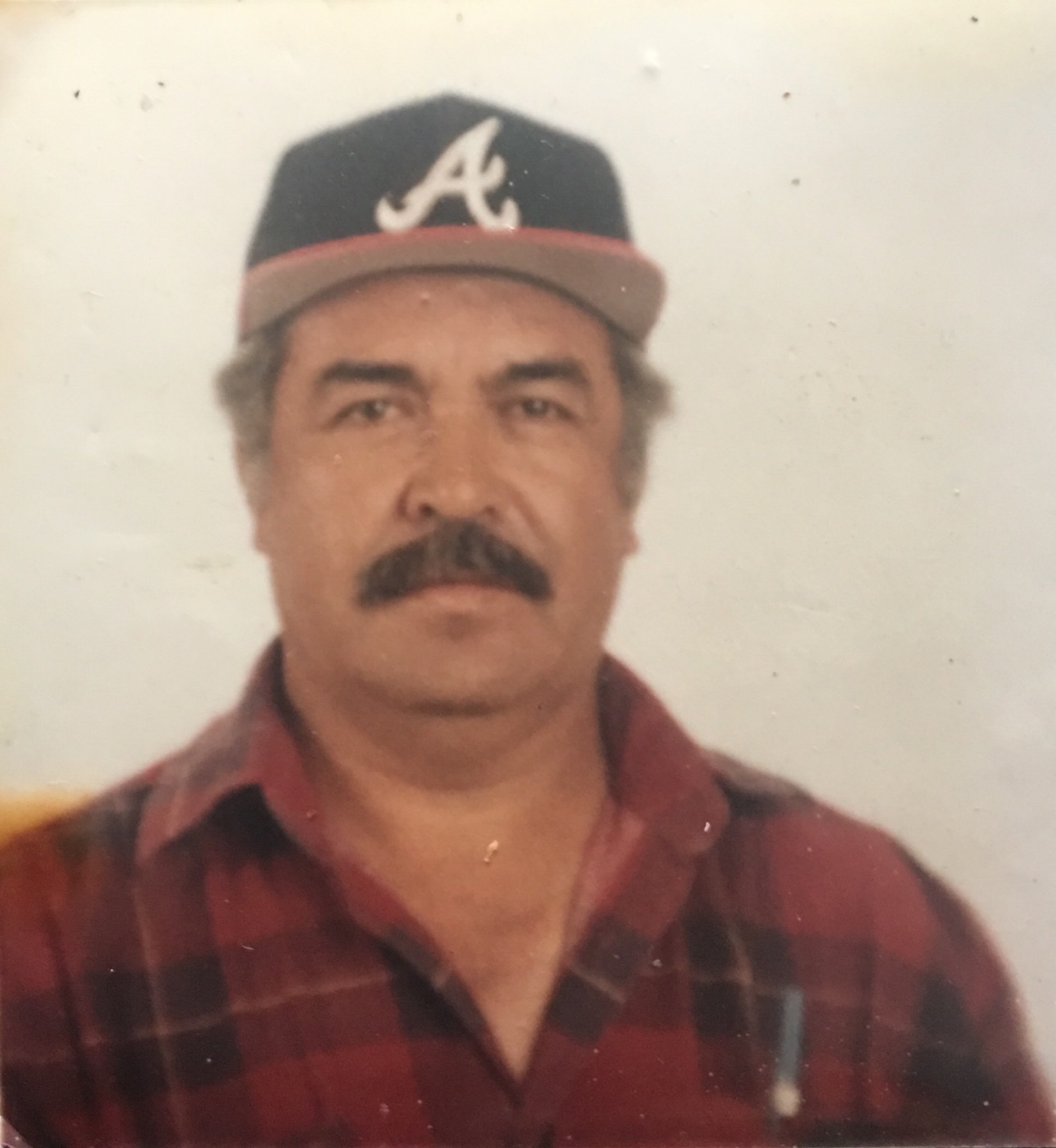 Baseball Player in Plaid Shirt.